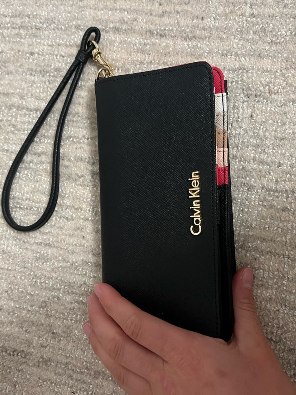 Calvin Klein Black Wristlet with Pink Trim and Gold Logo